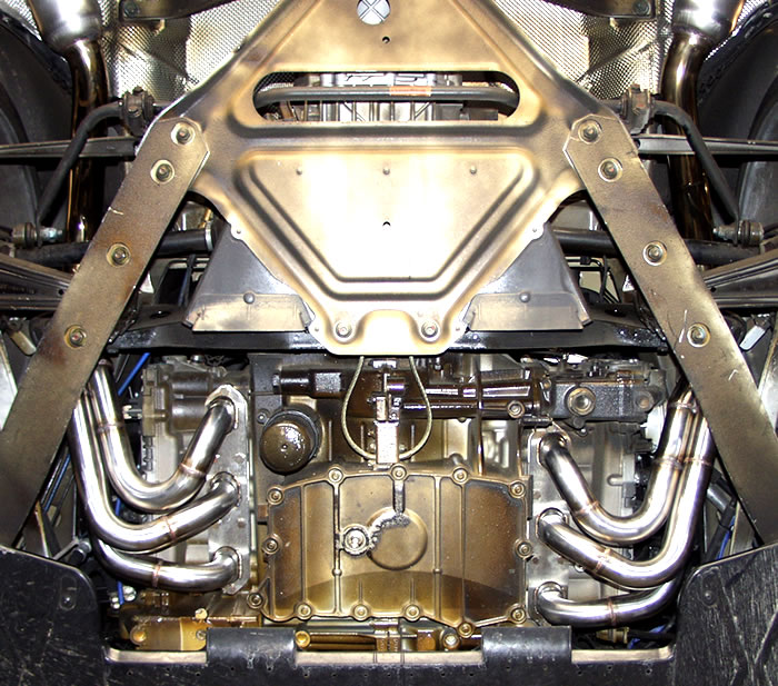 Billy Boat Headers installed and undercar on the Porsche Cayman