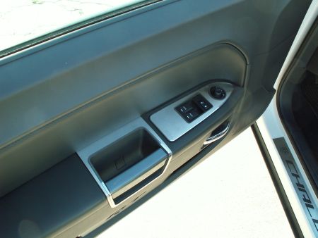 Door Arm Control Trim on Dodge Challenger