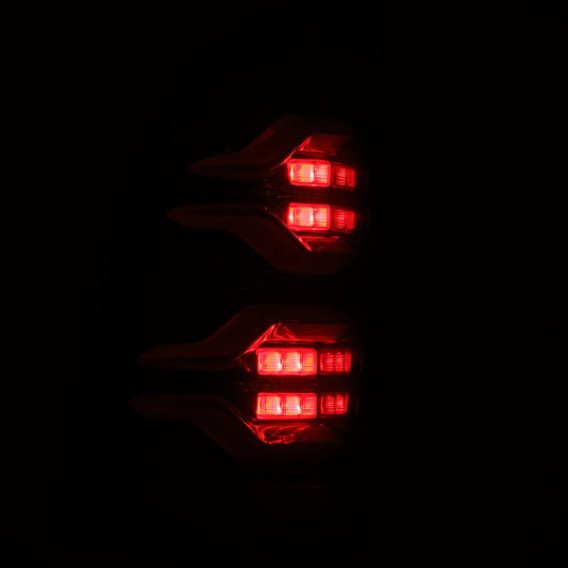 2005-2015 Toyota Tacoma AlphaRex LUXX-Series LED Tail Lights Alpha-Black with Activation Light an...